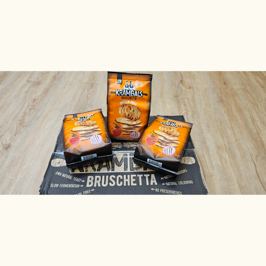 1x Karton (12 Tüten) Krambals Bruschetta Garden Grill - 840g - MHD: 08.10.2025