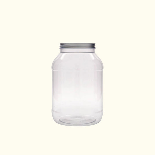 Leere, transparente Vorratsdose aus Kunststoff mit silbernem Schraubdeckel; gebraucht aus einem Süßigkeitenshop und trocken vorgereinigt. Ideal als nachhaltige Aufbewahrungsbox für Bastelzubehör, Werkstatt oder zur Vorratshaltung im Upcycling-Stil